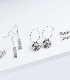 Geurkaars Kokosnoot Met Zilveren Oorbellen -Kaarsen Voor Thuis 26a7ce70540641e3beb51df666004979